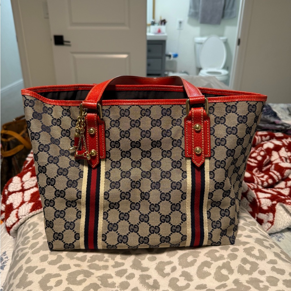Authentic Gucci tote tan and red. Comes with certificate of authenticity